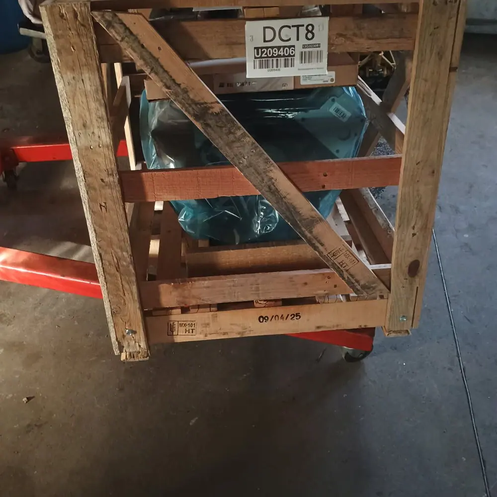 A remanufactured unit still crated and strapped, in off the truck